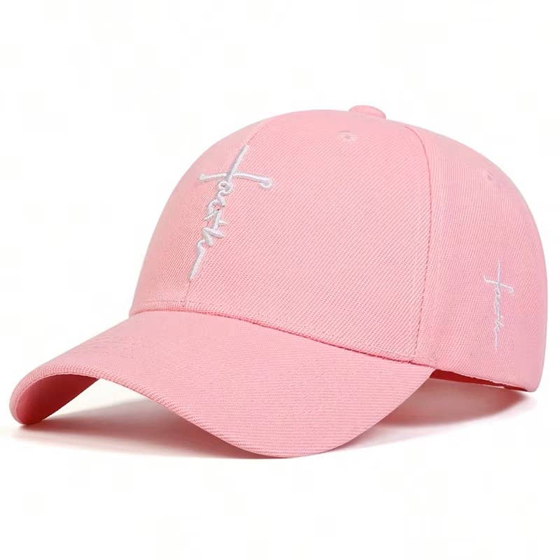 Pink baseball cap with white embroidered text on a white background