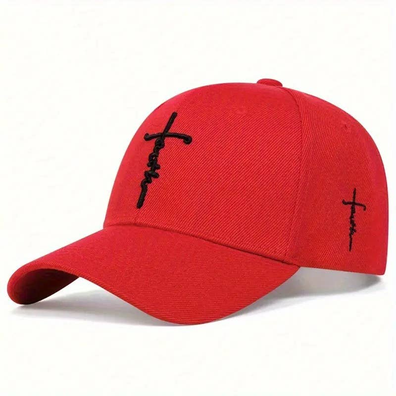 Red cap with black embroidered designs on a white background