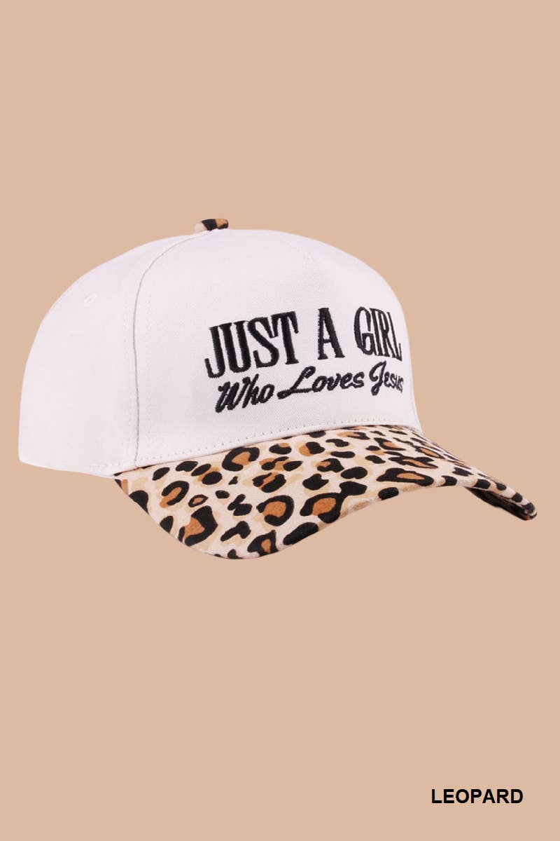 White cap with leopard print brim and 'Just a Girl Who Loves Guns' text on beige background