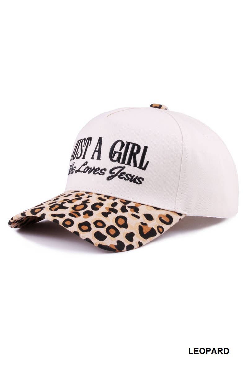 White cap with leopard print brim and text 'Just a Girl Loves Jesus' on a white background